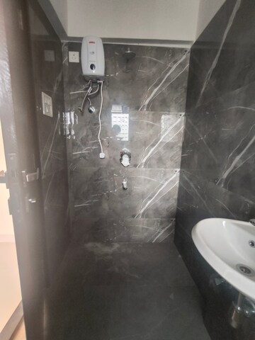Bathroom in 2 BHK Apartment at Dinaco Darshan CHS, Dahisar West – for Rent