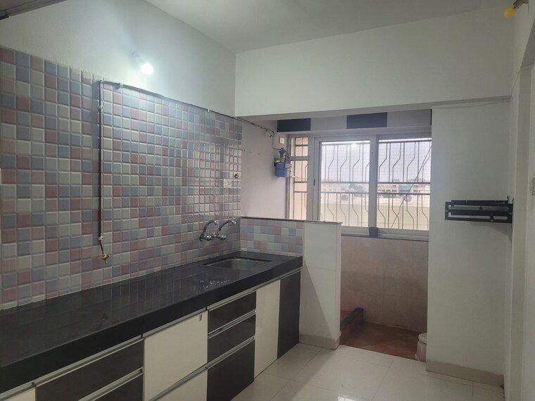 Kitchen, suvidha-damodar-vihar 1 Bedroom 550 Sq.Ft. Apartment In Manjari Pune 9091875