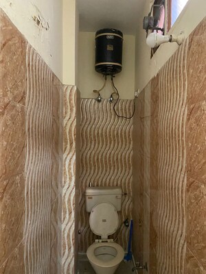 Bathroom in 2 BHK Apartment at Fort View Apartments, Kalkaji – for Rent