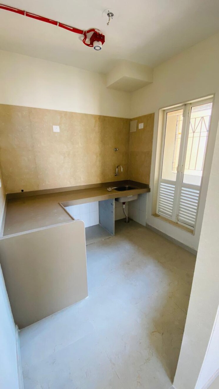 Kitchen, dosti-west-county 2 Bedroom 734 Sq.Ft. Apartment In Balkum Pada Thane 9091991