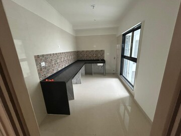Kitchen in 4 BHK Apartment at Rajesh Raj Infinia, Malad West – for Rent
