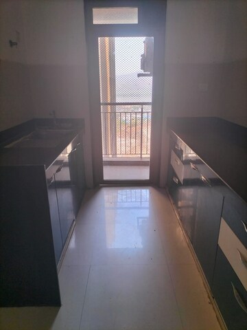 Kitchen in 2 BHK Apartment at Lodha Splendora, Ghodbunder Road – for Rent