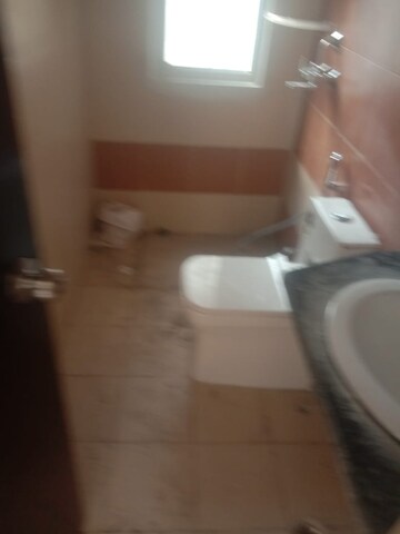 Bathroom in 3 BHK Apartment at Mahagun Mywoods, Sector 16c Greater Noida – for Rent