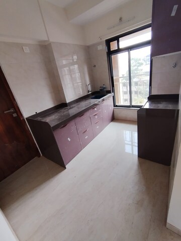 Kitchen in 2 BHK Apartment at Cosmos CHS Andheri, Andheri West – for Rent