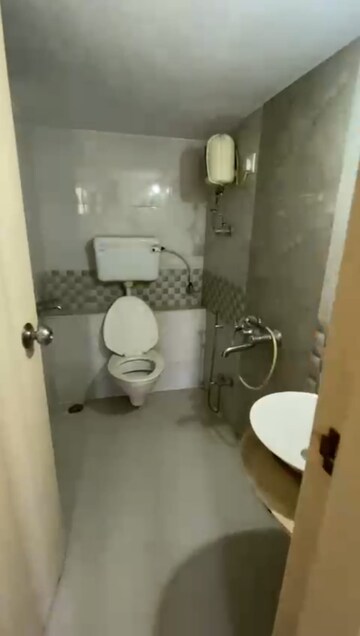 Bathroom in 2 BHK Apartment at Unique Aurum, Mira Road – for Rent