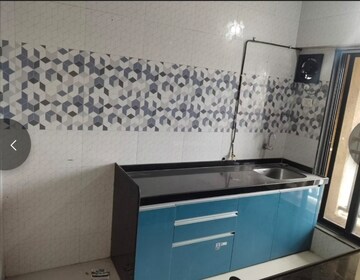 Kitchen in 1 BHK Apartment at Raunak Unnathi Woods, Ghodbunder Road – for Rent