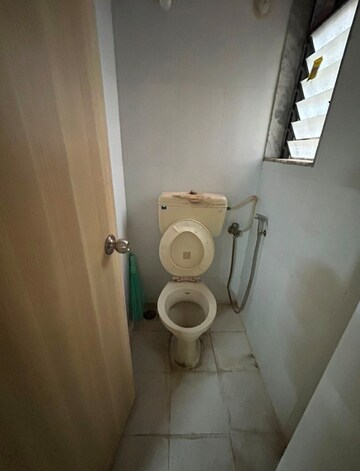 Bathroom in 1 BHK Apartment at Raunak Unnathi Woods, Ghodbunder Road – for Rent