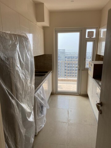 Kitchen in 3 BHK Apartment at DLF The Skycourt, Sector 86 – for Sale