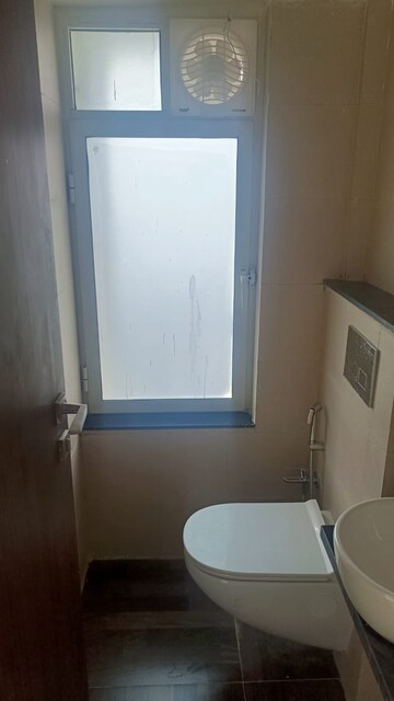 Bathroom in 2 BHK Apartment at Omkar Signet, Malad East – for Rent