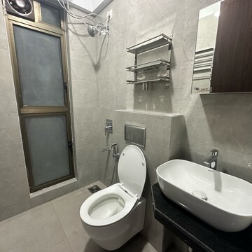 Bathroom in 1 BHK Apartment at Raymond Realty Phase II, Swastik Garden – for Rent