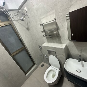 Bathroom in 1 BHK Apartment at Raymond Realty Phase II, Swastik Garden – for Rent