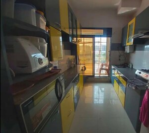 Kitchen in 3 BHK Apartment at Rustomjee Global City, Virar West – for Sale