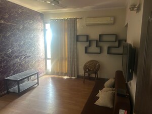 Living Room in 4 BHK Apartment at Unitech Heritage City, Sector 25 – for Sale
