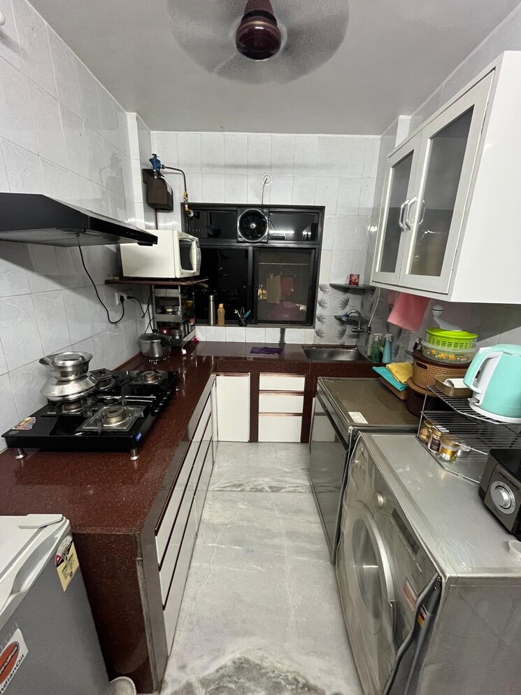 Kitchen, vishal-tower-uthalsar 1 Bedroom 950 Sq.Ft. Apartment In Uthalsar Thane 9092430