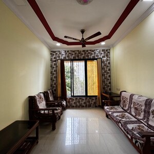Living Room in 2 BHK Apartment at Vasai West – for Sale