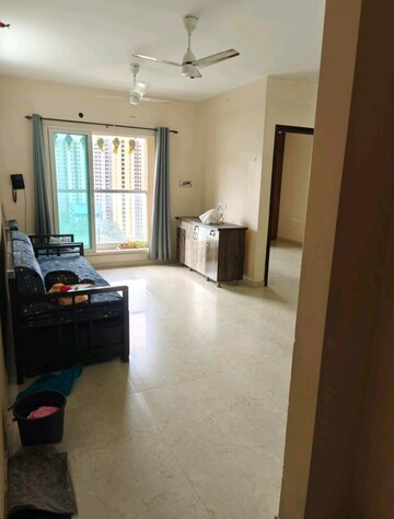 Living Room in 2 BHK Apartment at Dosti West County, Balkum Pada – for Rent