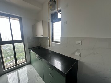 Kitchen in 1 BHK Apartment at Raymond Realty Phase II, Swastik Garden – for Rent
