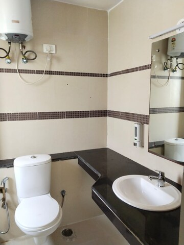Bathroom in 3 BHK Apartment at Unitech Uniworld Gardens 2, Sector 47 – for Rent