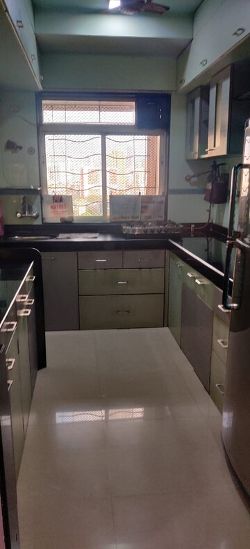 Kitchen in 2 BHK Apartment at Agarwal Trinity Tower II, Malad West – for Rent