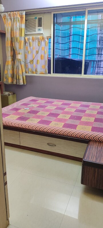 Bedroom in 2 BHK Apartment at Agarwal Trinity Tower II, Malad West – for Rent