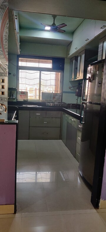 Kitchen in 2 BHK Apartment at Agarwal Trinity Tower II, Malad West – for Rent