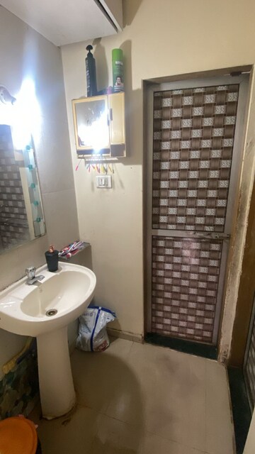 Bathroom in 1 BHK Apartment at Swapna Kiran CHS, Malad East – for Rent