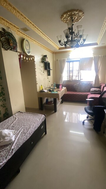 Living Room in 1 BHK Apartment at Swapna Kiran CHS, Malad East – for Rent