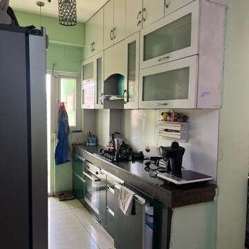 Kitchen in 3 BHK Apartment at Ajnara Daffodil, Sector 137 – for Rent
