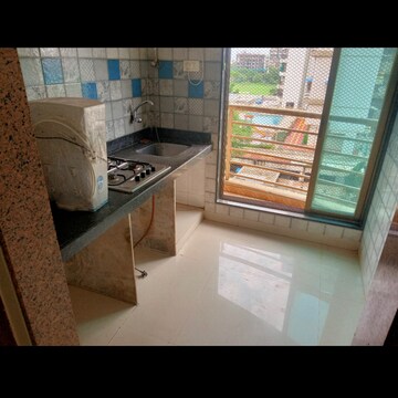 Kitchen in 1 BHK Apartment at Paradise Sai Riverdale, Taloja – for Sale