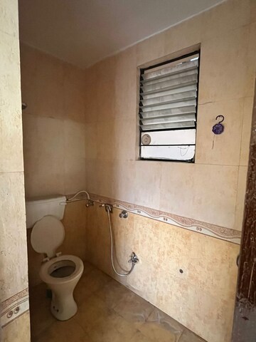 Bathroom in 2 BHK Apartment at Deokar Residency, Wadgaon Sheri – for Rent