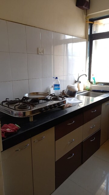 Kitchen in 2 BHK Apartment at Harmony Horizons, Ghodbunder Road – for Rent