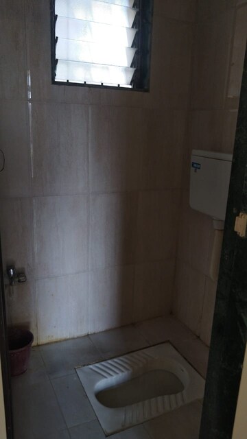 Bathroom in 1 BHK Apartment at Squarefeet Joy square, Kasarvadavali – for Rent