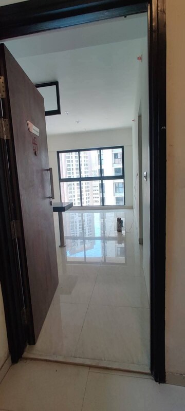 Living Room in 2 BHK Apartment at Lodha Crown Quality Homes, Majiwada – for Rent