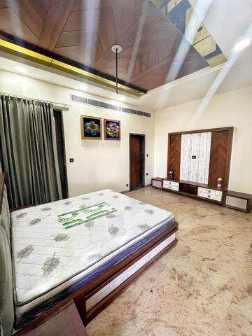 Bedroom in 6+ BHK Independent House at Mansarovar Extension – for Sale