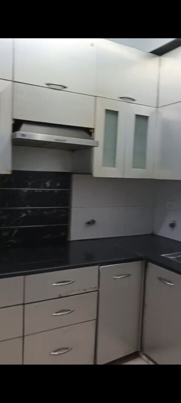 Kitchen in 2.5 BHK Apartment at SRS Royal Hills, Sector 87 – for Rent