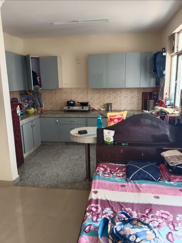 Kitchen in 2 BHK Apartment at Raheja Vedaanta, Sector 108 – for Sale