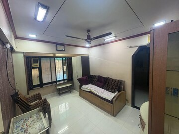 Living Room in 1 BHK Apartment at Yogi Dham CHS, Borivali West – for Rent
