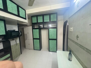 Kitchen in 1 BHK Apartment at Yogi Dham CHS, Borivali West – for Rent