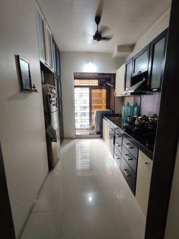 Kitchen in 2 BHK Apartment at Highland Annex, Majiwada – for Rent