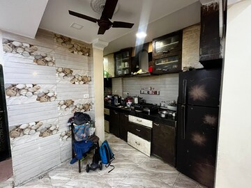 Kitchen in 3 BHK Apartment at Om Shiv Shakti CHS, Gtb Nagar – for Sale