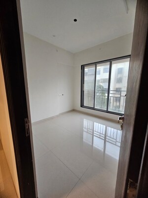 Room in 2 BHK Apartment at Westin Eksar Gurukripa CHS, Borivali West – for Sale