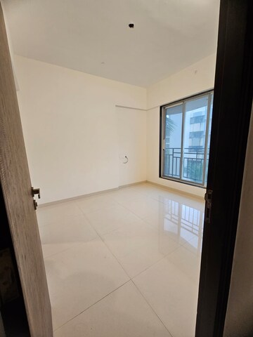 Room in 2 BHK Apartment at Westin Eksar Gurukripa CHS, Borivali West – for Sale