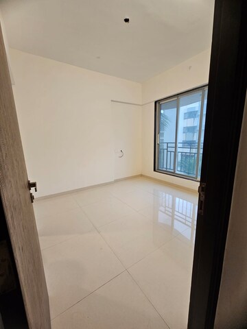 Room in 2 BHK Apartment at Westin Eksar Gurukripa CHS, Borivali West – for Sale