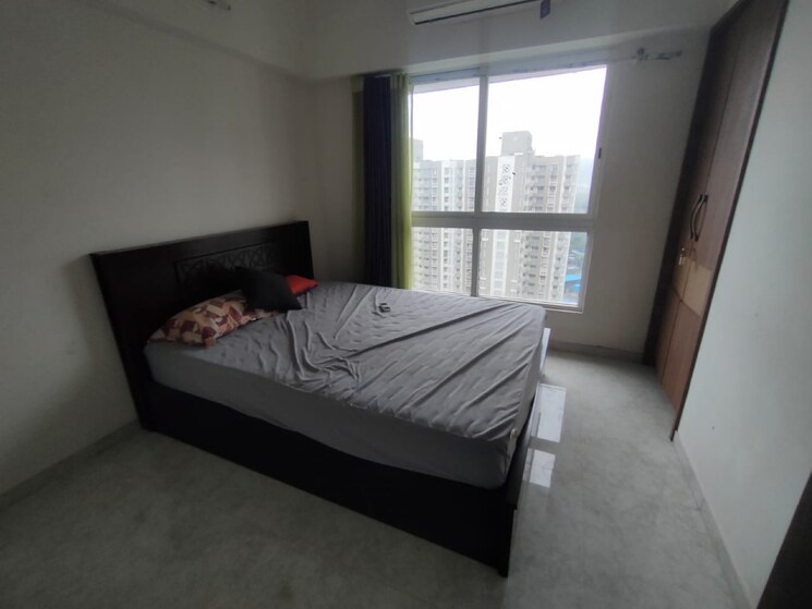 Bedroom, raymond-realty-phase-ii 2 Bedroom 635 Sq.Ft. Apartment In Swastik Garden Thane 9093380