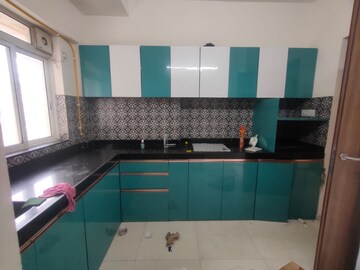 Kitchen in 2 BHK Apartment at Raymond Realty Phase II, Swastik Garden – for Rent