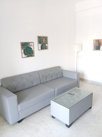 Living Room in 1 BHK Apartment at Goodwill Vrindavan, Wadgaon Sheri – for Rent
