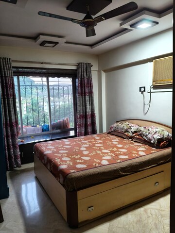 Bedroom in 2 BHK Apartment at Harbour Court, Nerul Sector 19a – for Rent