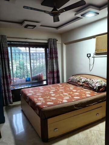 Bedroom in 2 BHK Apartment at Harbour Court, Nerul Sector 19a – for Rent