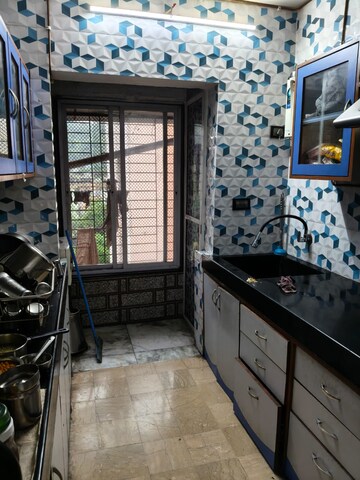 Kitchen in 2 BHK Apartment at Harbour Court, Nerul Sector 19a – for Rent