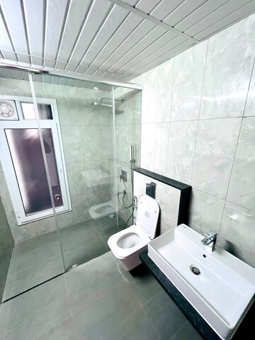 Bathroom in 4 BHK Apartment at L&T Raintree Boulevard, Hebbal – for Rent